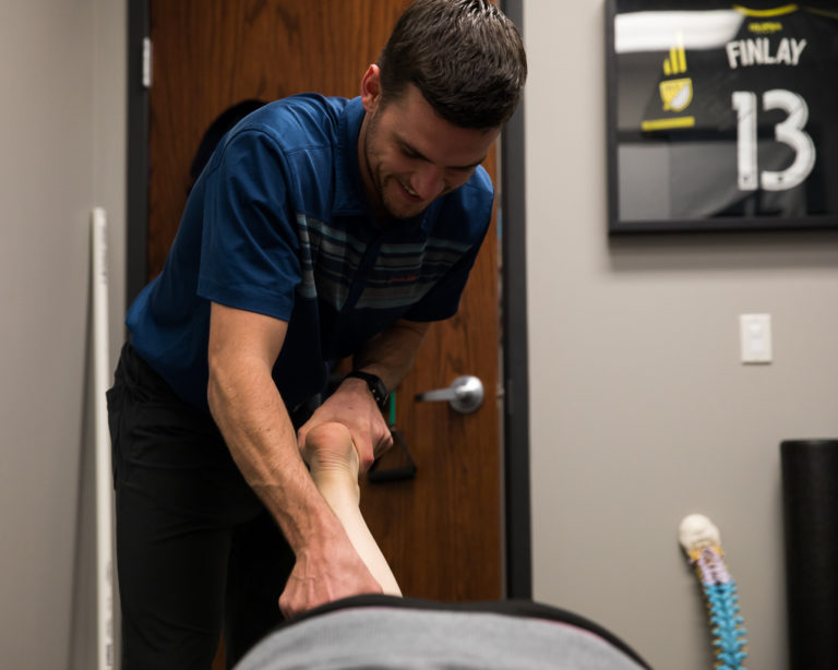 Omaha Sports Chiropractor Adjustment